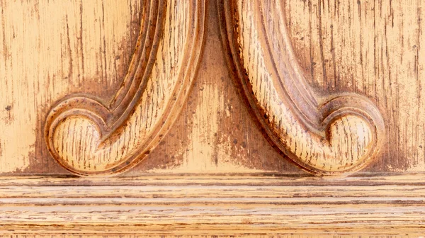 Old traditional moulding design on a plywood bentwood headboard with bevels and curves for traditional design. Useful as a backdrop or sample of furniture design. — Stock Photo, Image