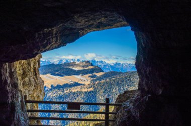 unexpected panorama from a cave of the first world war on Monte Portule on the Asiago plateau, in the Province of Vicneza, Italy clipart