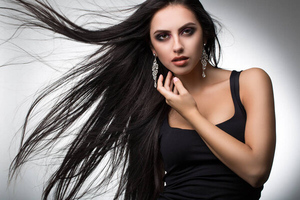 burning brunette with long hair