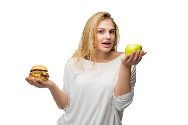 Girl in choosing the right food Stock Image