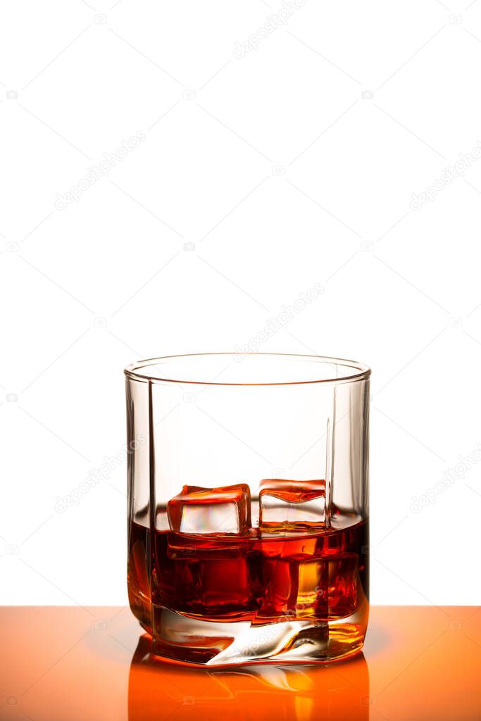 a glass of gourmet whiskey, waiting for a pleasant evening