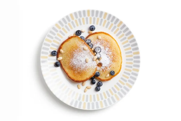 Composition Isolée Sur Une Assiette Crêpes Avec Sucre Glace Bleuets — Photo