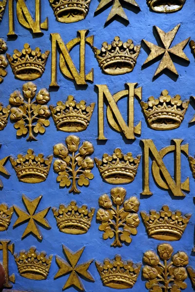 gold royal symbols of power against blue backgroud