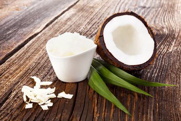 Shredded coconut with hard coconut oil. — Stock Photo, Image