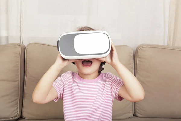 Young kid playing virtual reality.