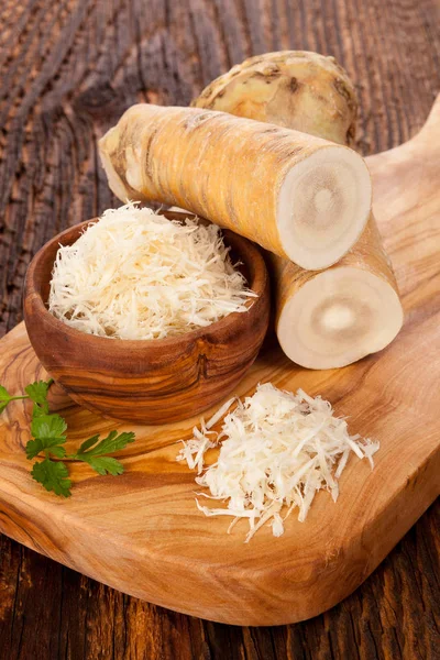 Fresh Horseradish on wooden table — Stock Photo, Image