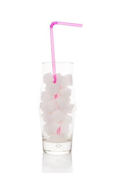 Sugar cubes in glass. — Stock Photo, Image