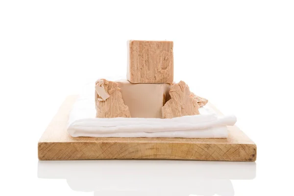 Yeast Blocks Wooden Board Isolated White Background — Stock Photo, Image