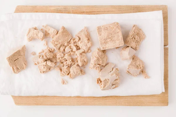Fresh Pressed Yeast Blocks Wooden Board Isolated White Background — Stock Photo, Image