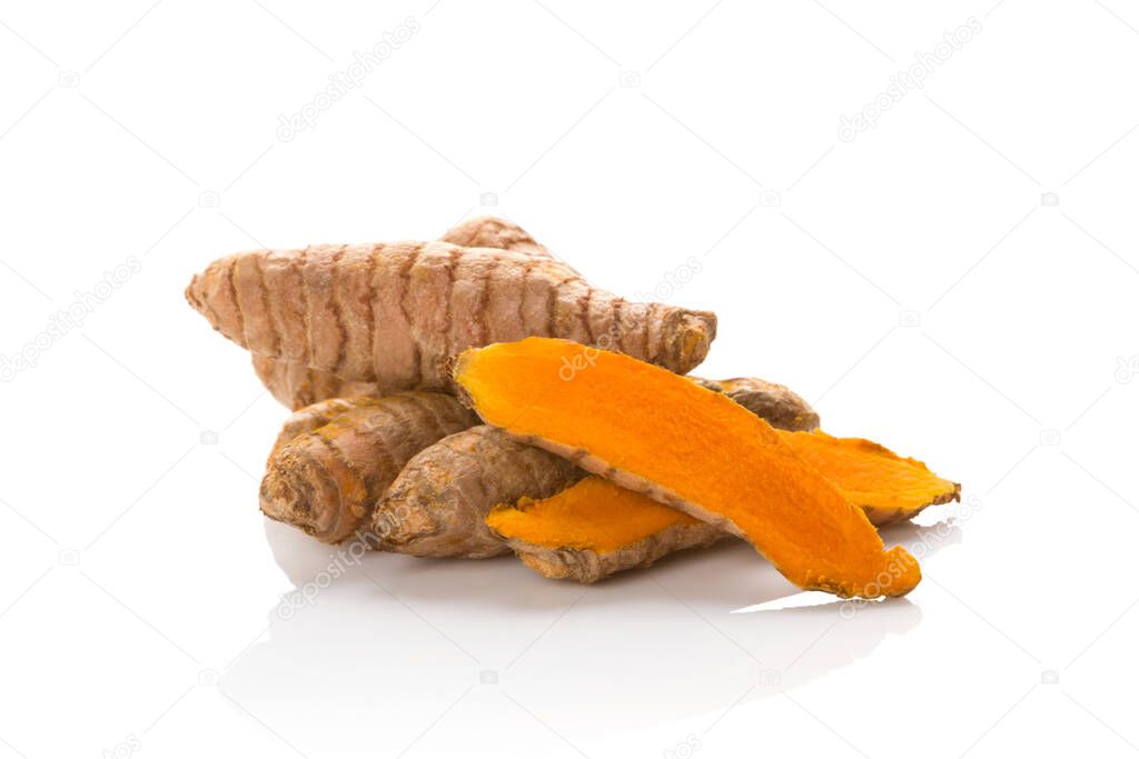 Turmeric root on white background. Natural antioxidant, herbal remedy.