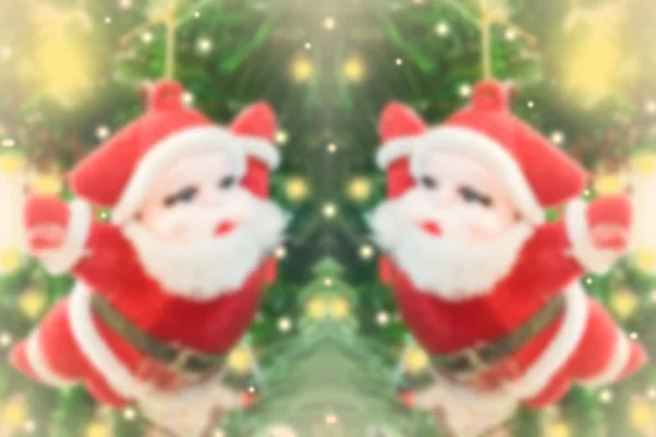 Santa docka hängande på julgran — Stockfoto