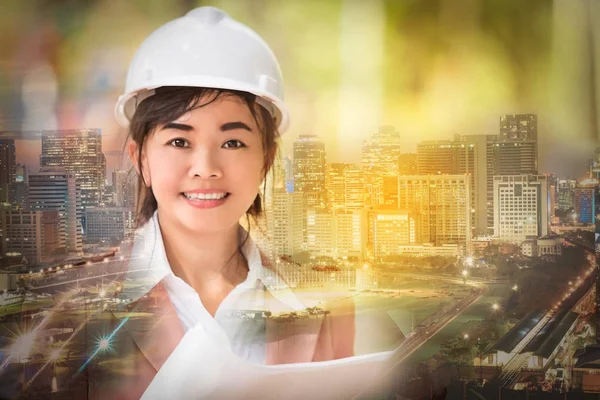 executive Asian engineer woman and cityscape scene