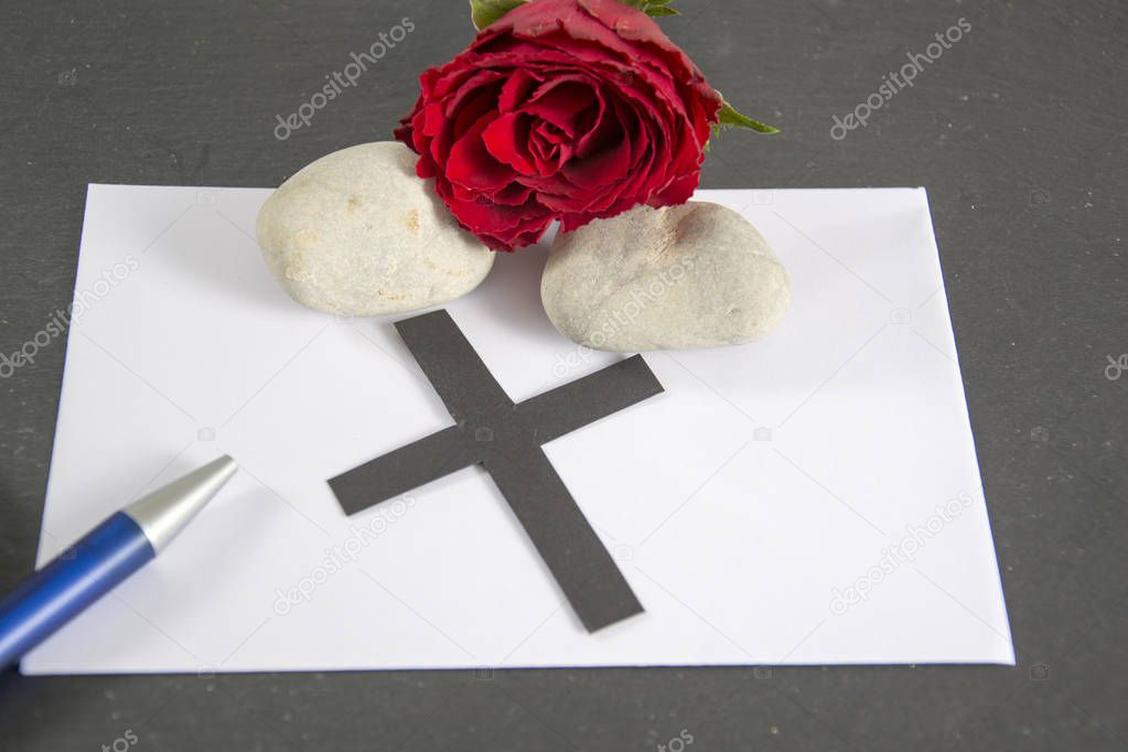 death  written on a black cross
