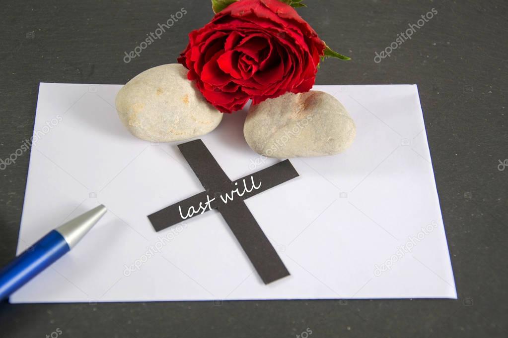 last will  written on a black cross