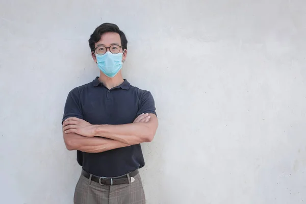 Chinese man wearing a face protection mask
