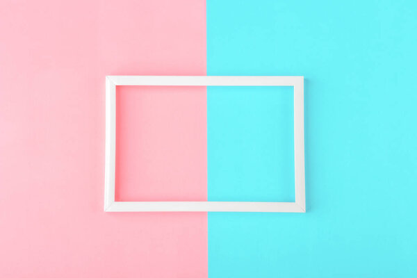 Empty white frame on a duotone background (blue, pink) with copy space for text or lettering. Minimal geometric lines composition. Top view, flat lay, mock up.