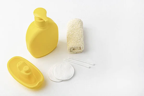 Download Mock Up Of Baby Bath Products Yellow Bottle For Shampoo Shower Gel Lotion Towel And Cotton