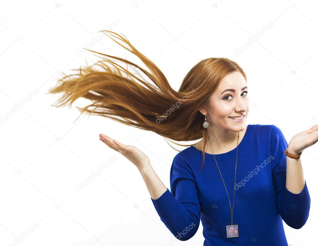 Girl with flying hair.Young smiling girl with long healthy hair. Healthy strong hair. Strong hair. Beautiful slim girl with a haircut. Hair style