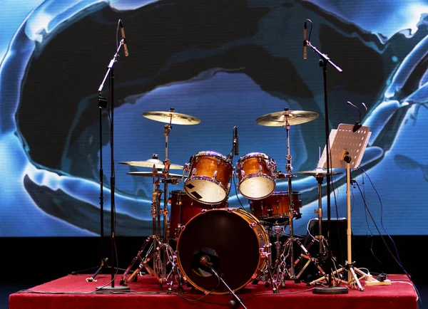 Drum kit on the big stage.Drums under the spotlights.Drums