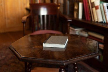Old book on the table in the library
