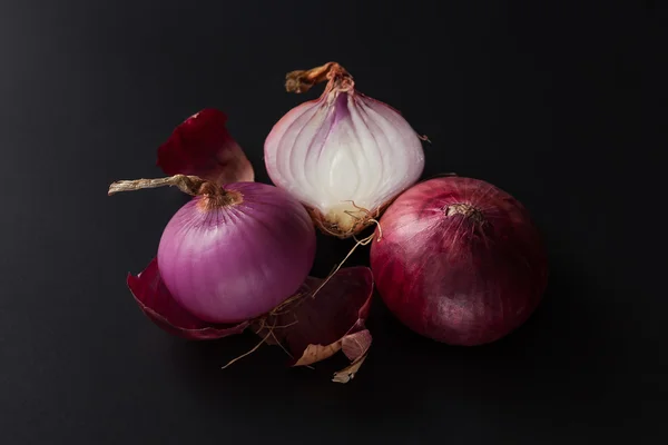 Shallots still life black background — Stock Photo, Image