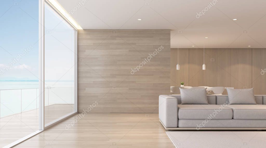 Perspective of modern luxury living room with sofa on sea view background, timber interior design - 3D rendering.
