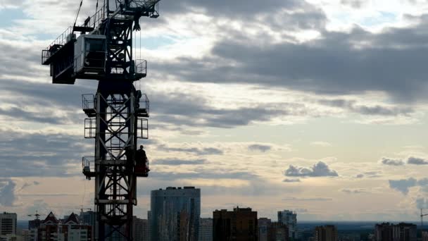 RUSSIA, Novosibirsk - May 5, 2020: Cranes, construction crane equipment over building. technology transportation — Stock Video