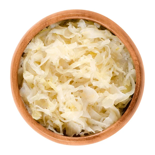 German sauerkraut in wooden bowl over white — Stock Photo, Image