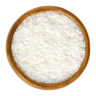 Bir ahşap kase beyaz içinde Hindistan cevizi flakes