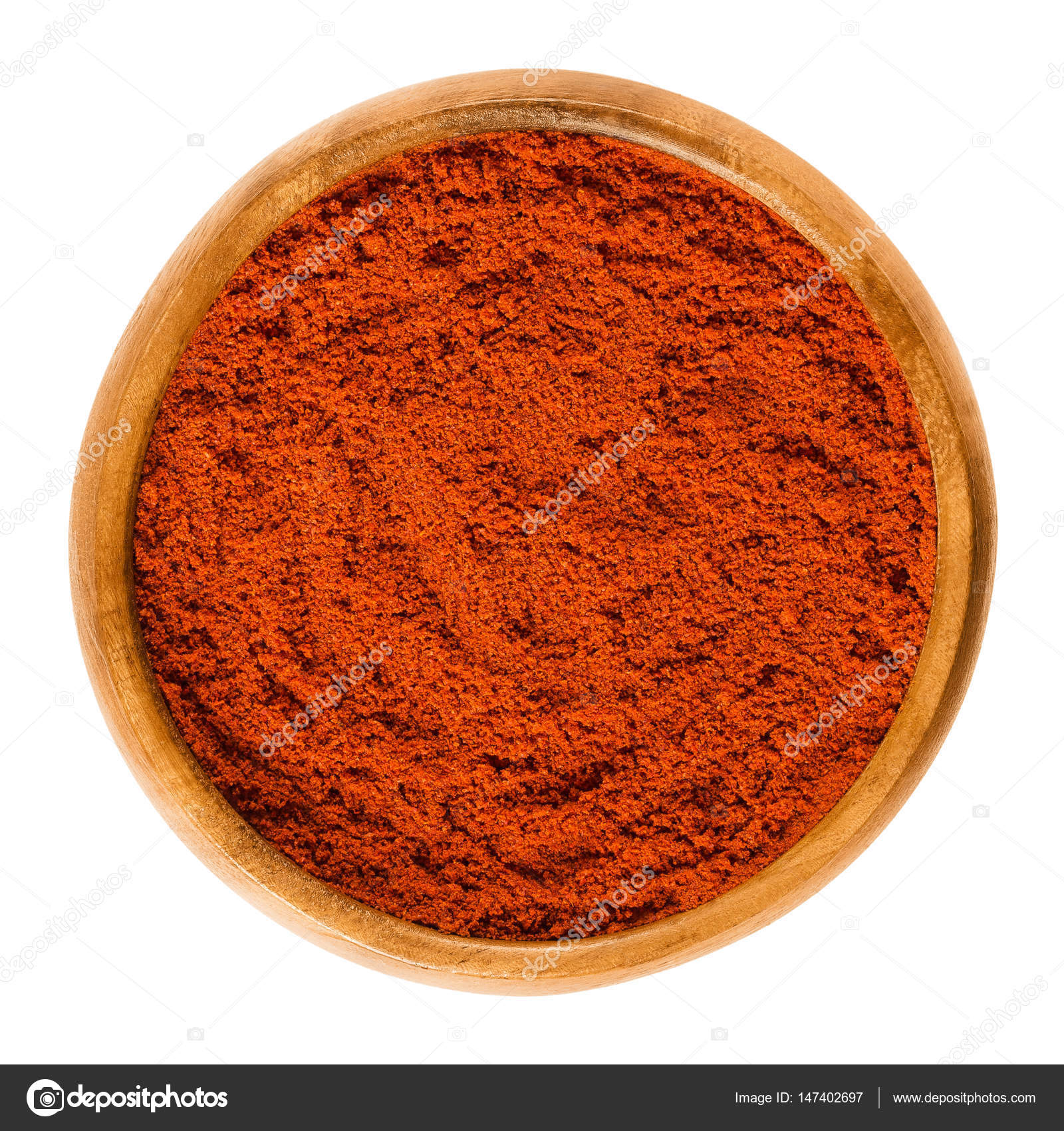 Sweet Pepper Red Paprika Powder In Wooden Bowl Over White Stock