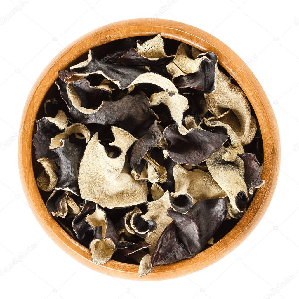 Dried black fungus Jew's ear in wooden bowl