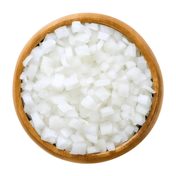 White onion cubes in wooden bowl over white — Stock Photo, Image