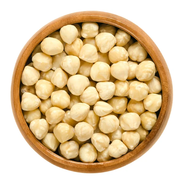 Blanched hazelnuts in wooden bowl — Stock Photo, Image