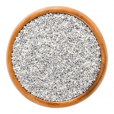 Ahşap kase içinde beyaz beyaz ve gümüş nonpareils