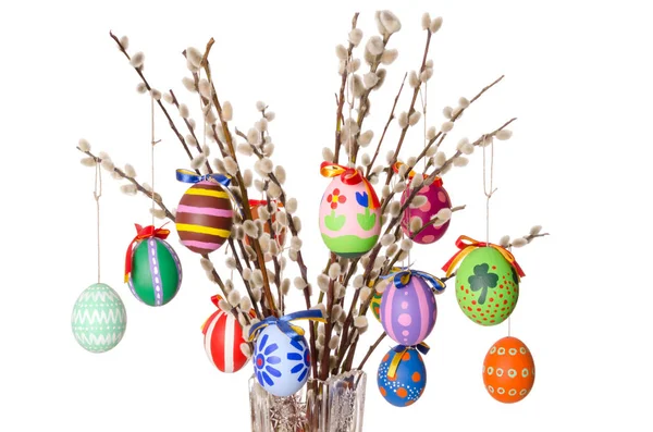 Colored easter eggs on willow bouquet with pussy willows — Stock Photo, Image