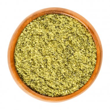 Ahşap zemin pepita balkabağı tohumları üzerinde beyaz kase