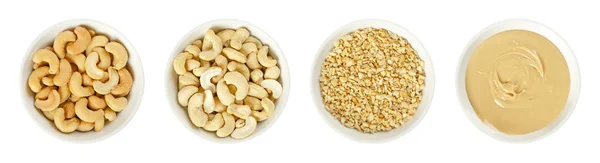 Cashews, raw and processed, in white bowls over white — Stock Photo, Image