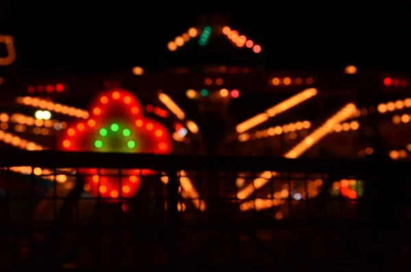 Bokeh, desenfoque de luz en el fondo de la noche — Foto de Stock