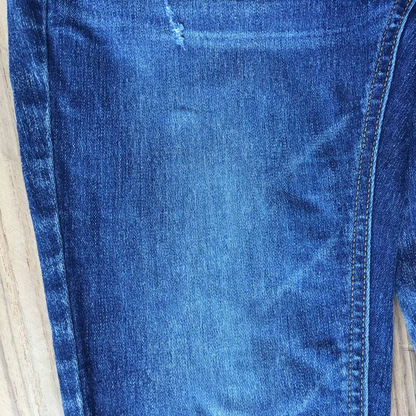 Denim jeans tekstury lub denim jeans tło z stare podarte. — Zdjęcie stockowe