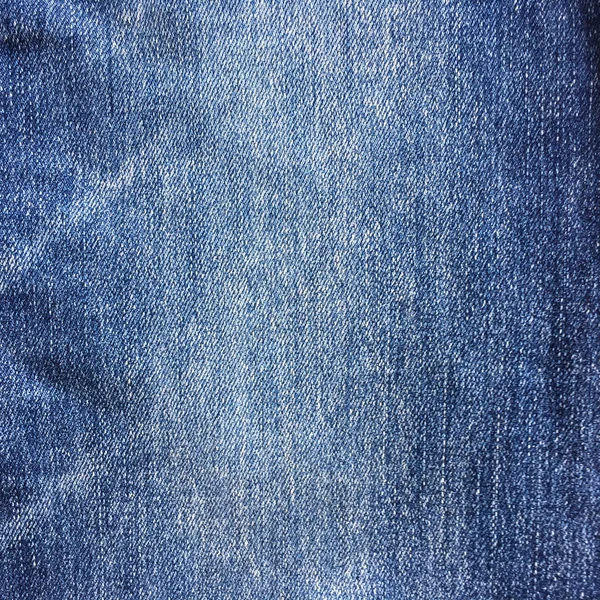 Denim jeans textuur of denim jeans achtergrond met oude gescheurd. — Stockfoto