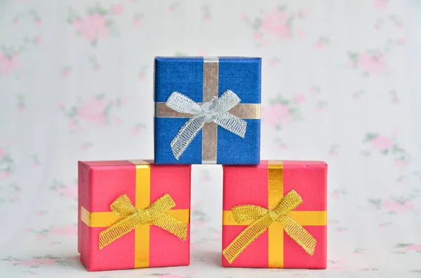 Earrings, flower boxes on the floor.