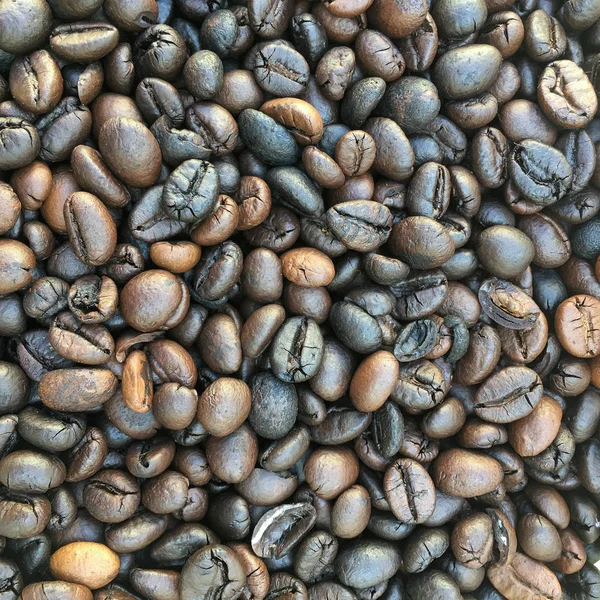 Granos de café tostados, se puede utilizar como fondo —  Fotos de Stock