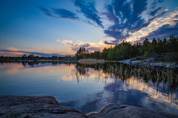 Karelia. Russia. Ladoga. Scenery. The nature of Karelia. Northern nature. Travel to Karelia. Panorama of Lake Ladoga. The rocky coast. Forest landscape. Untouched nature in Russia. — Stock Image Karelia. Russia. Ladoga. Scenery. The nature of Karelia. Northern nature. Travel to Karelia. Panorama of Lake Ladoga. The rocky coast. Forest landscape. Untouched nature in Russia. Stock Photo