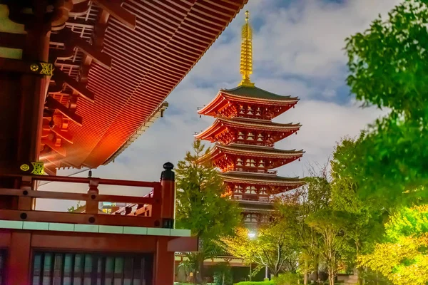 Japan. Tokyo. Asakusa Temple. Pagoda of the Sensoji Temple in Tokyo. Religious sights of Japan. Red buddhist temple on the background of the sky. Multistory Shinto shrine. Japanese cities.