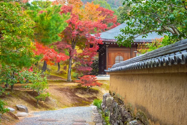 Kyoto. Japan. Medieval architecture of Japan. Ancient buildings in the park. Guide to parks in Japan. Gardens in Kyoto. Colorful trees. Autumn landscape. Nature of east Asia. Single tours in Kyoto.