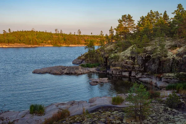 Corellia Russia. Ladoga lake. Landscapes of Corellia. Landscape of Lake Ladoga. Pond in the coniferous forest. Corellia in sunny weather. Lake in the taiga. Nature of Northern Russia. — Stock Image Corellia Russia. Ladoga lake. Landscapes of Corellia. Landscape of Lake Ladoga. Pond in the coniferous forest. Corellia in sunny weather. Lake in the taiga. Nature of Northern Russia. Stock Photo