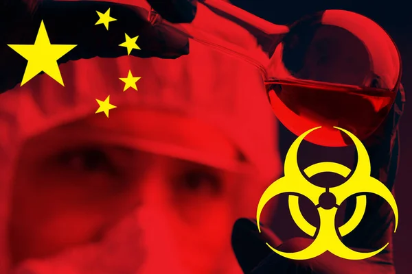 Warning biological hazard in China. People work in protective suits and masks. The biohazard sign. Possible harm to human health. Virological and bacteriological research in China.