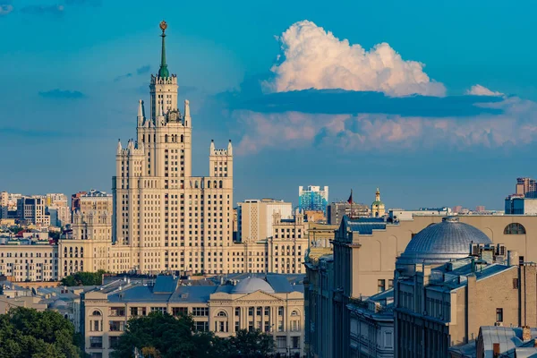 Moscow. Russia. Seven sisters. High-rise building on a background of blue sky. Moscow skyline. Roof of the building. Russian architecture. Traveling to the cities of Russia. Buildings of Moscow.