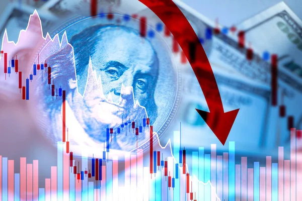 Red graph and arrows on the background of dollars. The fall of the economy. The fall of the financial market. Currency market. Economic crisis. The dollar is going down. Red arrow next to Franklin