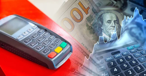 POS-terminal on the background of dollars and a calculator. Increase in the share of non-cash payments. Payments for goods and services using Bank cards. Types of payments for purchases.